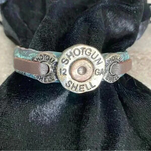 Western 12 gauge shell casing hammered metal base leather adjustable strap
